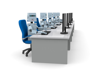 パソコンの前に座るロボット