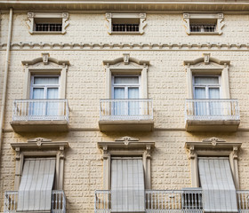 Six Windows in Beige Stone Building