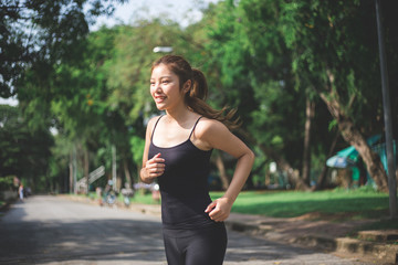 Young asian lady exercise outdoors