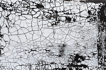 An abstract close-up of old, cracked paint