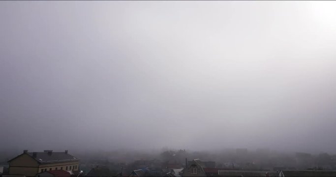 Morning fog movement over the city