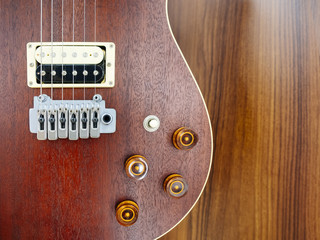 Electric Guitar close up on wooden background Music lifestyle background
