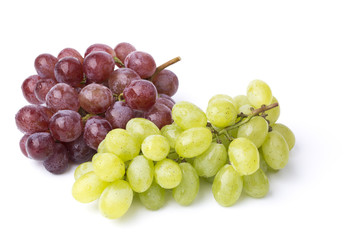 A bunch of green and red grapes isolated in a white 
