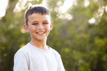 Portrait of a smiling white boy looking to camera
