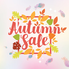 Fototapeta na wymiar Vector banner with the inscription Autumn sale. Can be used for flyers, banners or posters. Vector illustration with colorful autumn leaves and feathers