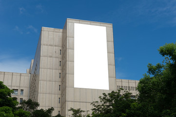 Large blank billboard on a street wall, banners with room to add your own text