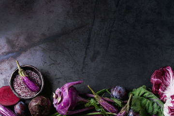 Assortment raw organic of purple vegetables mini eggplants, spring onion, beetroot, radicchio...