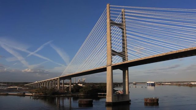 The ship passing under the bridge built over St. John River (Jacksonville, Florida).