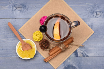 Alcohol and honey on grey vintage background