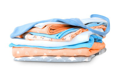 Stack pile folded cotton clothes on white.