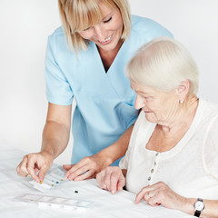 Carer and elderly person 