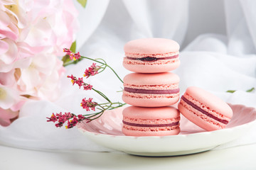 Pink strawberry macarons. French delicate dessert for Breakfast