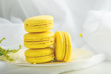 Yellow banana macarons. French delicate dessert for Breakfast