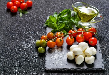 Mozzarella, cherry tomatoes and basil 