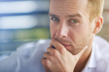 Confident handsome man looking at you