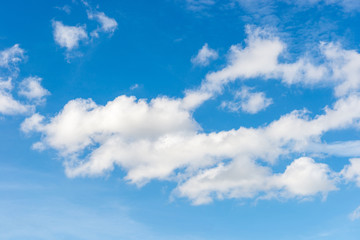 Naklejka na ściany i meble White clouds in summer blue sky background