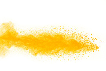 abstract yellow powder splatted on white background,Freeze motion of yellow powder explosion.