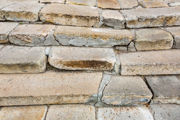 Original textured surface of of a natural coarse stone
