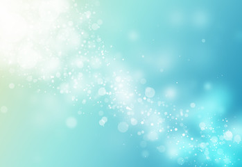 Blue glitter sparkles rays lights bokeh Festive Christmas Elegant abstract background.