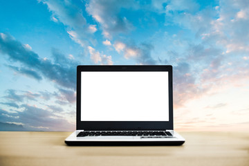 Fototapeta premium Laptop with sky background