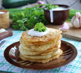 Fritters of zucchini. Zucchini Pancakes