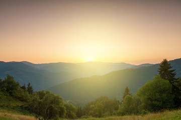 Panoramic view of colorful sunrise in mountains