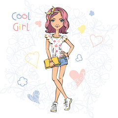 Cute beautiful girl in t-shirt and shorts, with a ribbon in his hair and a bag clutch