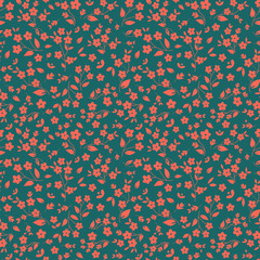 Seamless floral vector pattern orange pinkish small flowers on dark green background, ditzy, millefleaurs, fabric, tapestry, quilting