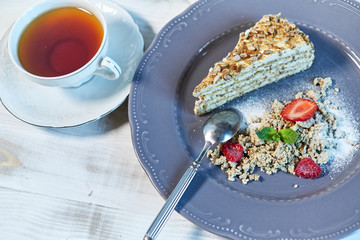 Tiramisu dessert on wooden table. Top view with copy space jpg