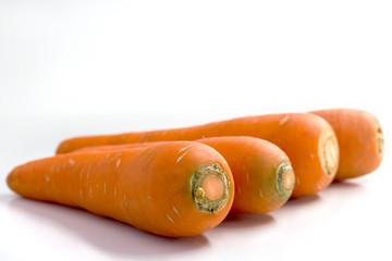 Fresh carrots isolated on white background.