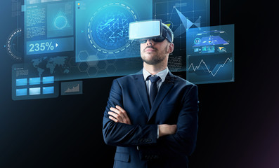 businessman in virtual reality headset over black