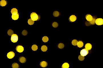 Defocused bokeh lights in blur night background