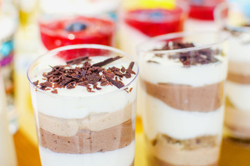 Dessert ice cream with chocolate crumb in a glass cup