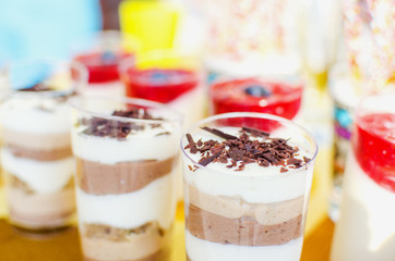 Dessert ice cream with chocolate crumb in a glass cup