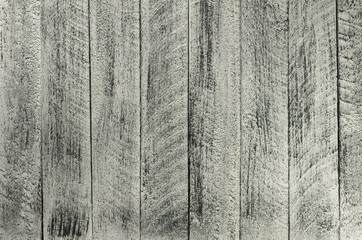 Fototapeta premium Painted in grey and white color wall with wooden planks.