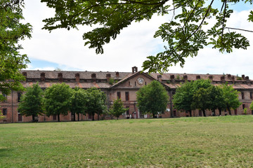 Abandoned and ruined buildings of the ancient damaged Cittadella of Alessandria in Italy.