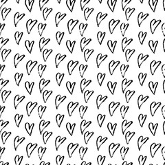 Abstract seamless hearts pattern. Ink grunge illustration. Black and white background.