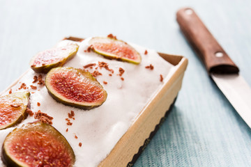Delicious fig cake on blue background

