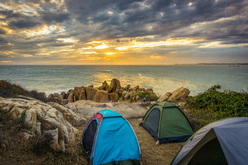 Tents camping in sunset