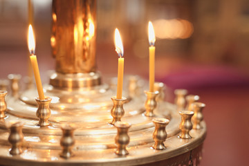 Candles and lamp close-up. Interior Of Orthodox Church In Easter. baby christening. Ceremony a in...