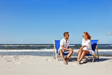 two lovers on beach and summer time 