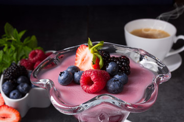 delicious pudding with wild berry