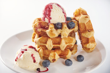 Close up of sweet waffles on white