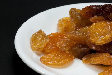 Raisin with black background
