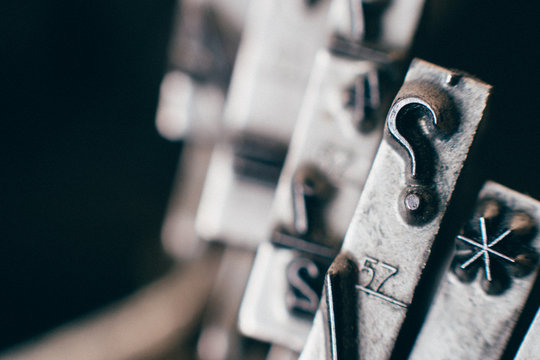 Closeup of Typewriter Question Mark Hammer