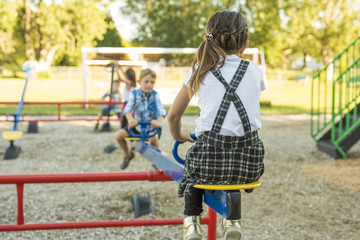 cheerful school age child play on playground school