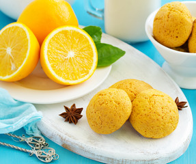 Homemade gourd cakes with oranges.