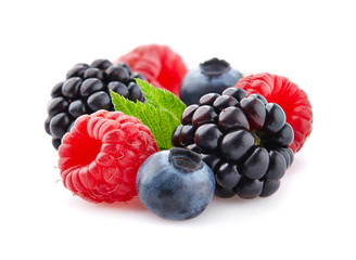 Mix berries in closeup with leaf