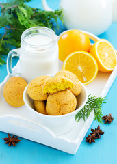 Homemade gourd cakes with oranges.
