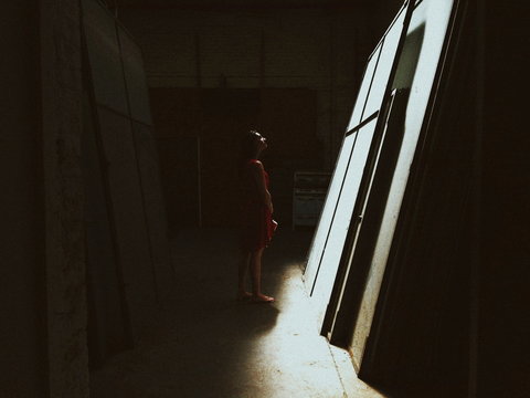 A woman and a large canvas